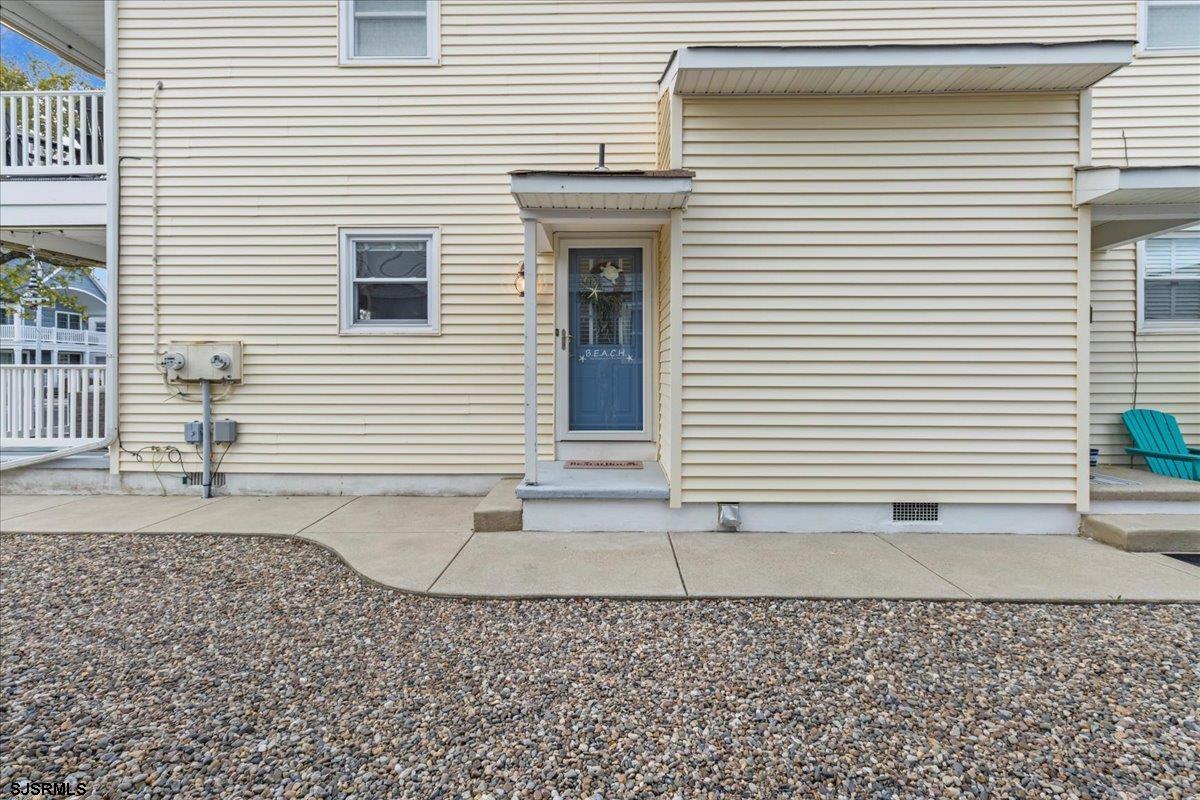 331 41st Street South, Unit 1 Brigantine, NJ 08203 - Photo 27 of 42 a white house with a white door