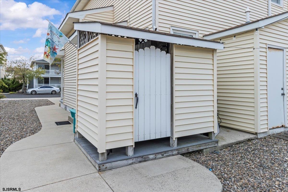 331 41st Street South, Unit 1 Brigantine, NJ 08203 - Photo 30 of 42 a view of a back yard of the house