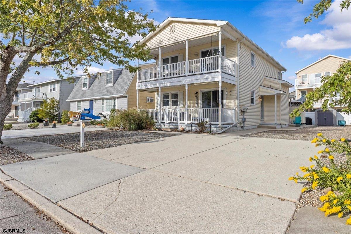 331 41st Street South, Unit 1 Brigantine, NJ 08203 - Photo 3 of 42 a front view of a building with street view