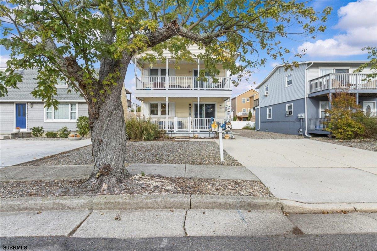 331 41st Street South, Unit 1 Brigantine, NJ 08203 - Photo 4 of 42 a front view of a house with garden