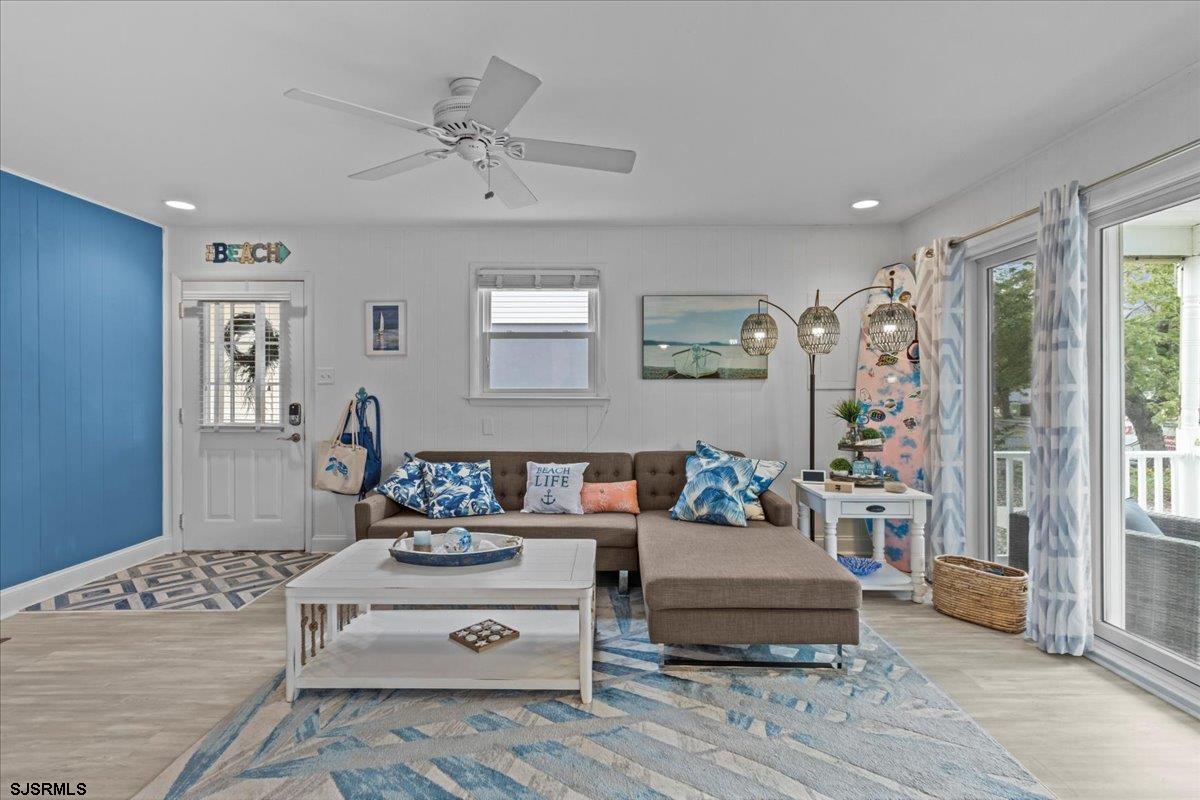 331 41st Street South, Unit 1 Brigantine, NJ 08203 - Photo 7 of 42 a living room with furniture and a wooden floor