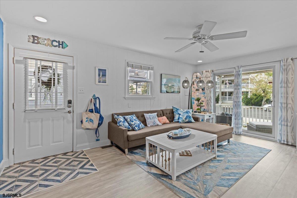 331 41st Street South, Unit 1 Brigantine, NJ 08203 - Photo 8 of 42 a living room with furniture and a window