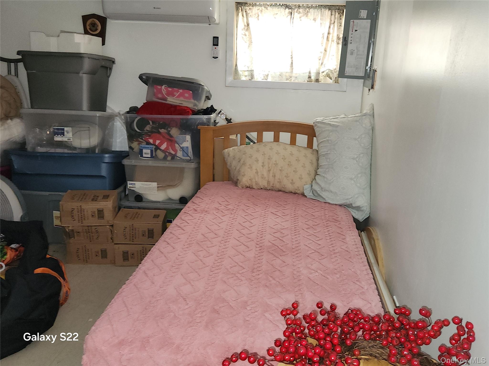 46 Randolph Road White Plains, NY 10607 - Photo 15 of 16 Bedroom featuring a wall mounted air conditioner