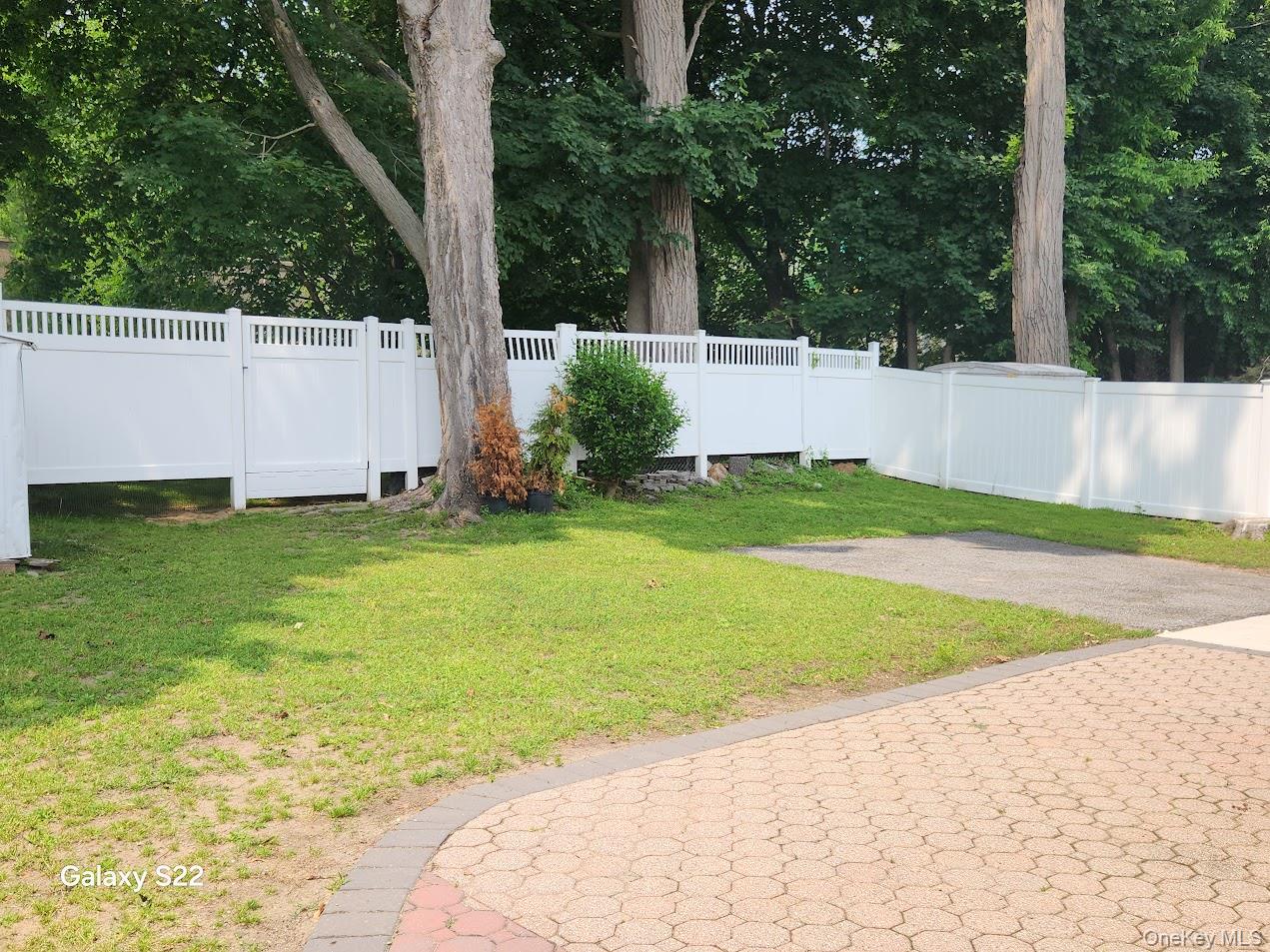 46 Randolph Road White Plains, NY 10607 - Photo 4 of 16 Fenced backyard with a patio