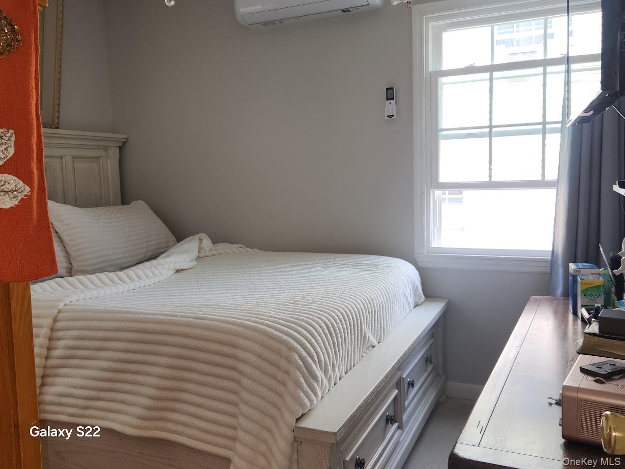 46 Randolph Road White Plains, NY 10607 - Photo 9 of 16 Bedroom with a wall unit AC and baseboards