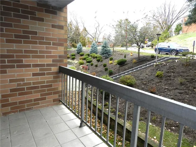 a view of bathroom with dual sinks