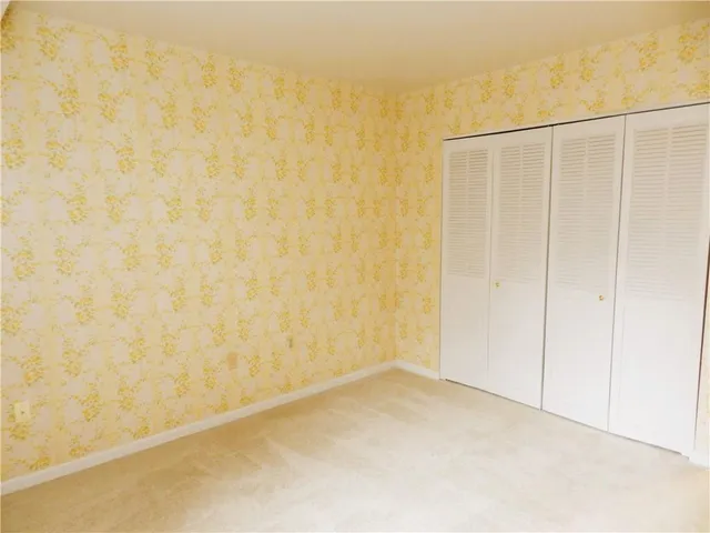 a view of a room with a window