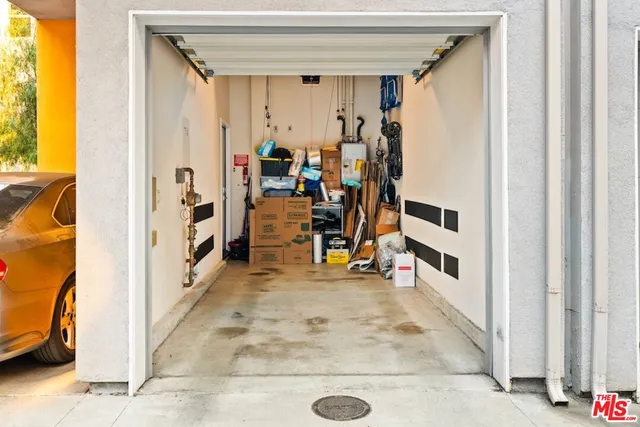 a view of a room with lots of gym equipment