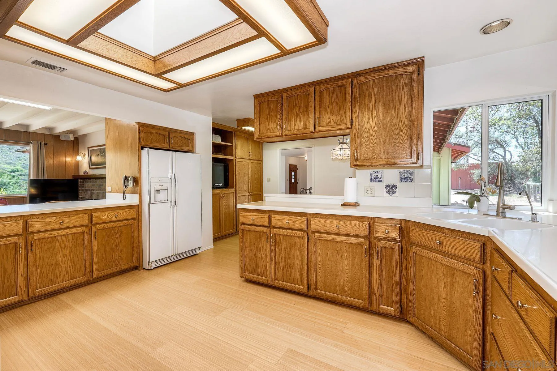 15525 Lyons Valley Road Jamul, CA 91935 - Photo 14 of 53 a kitchen with cabinets a sink and appliances