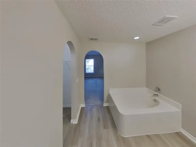 a bathroom with a bathtub
