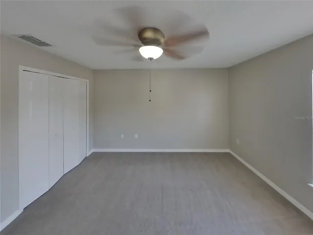 an empty room with an empty space and a window