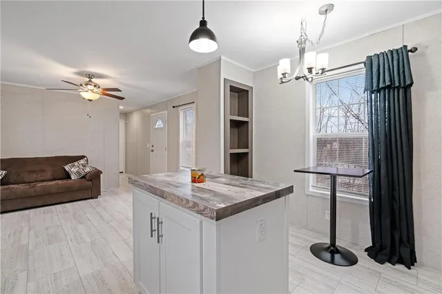 a view of kitchen and chandelier