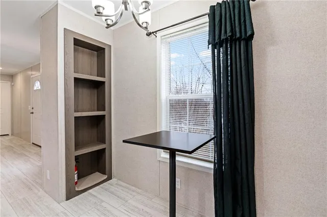 a close view of a sink and a microwave