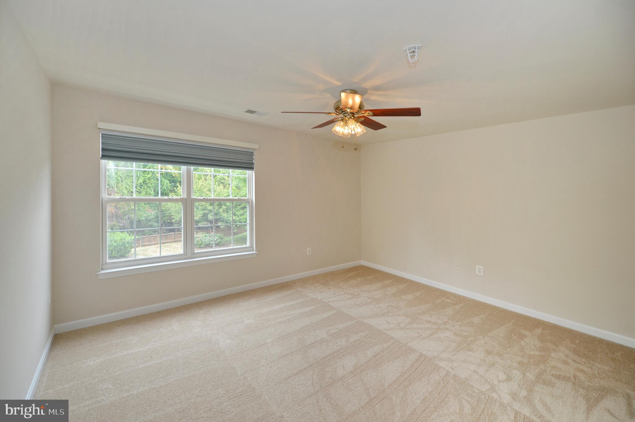 511 Constellation Square Southeast, Unit E Leesburg, VA 20175 - Photo 18 of 34 Spacious Primary Bedroom