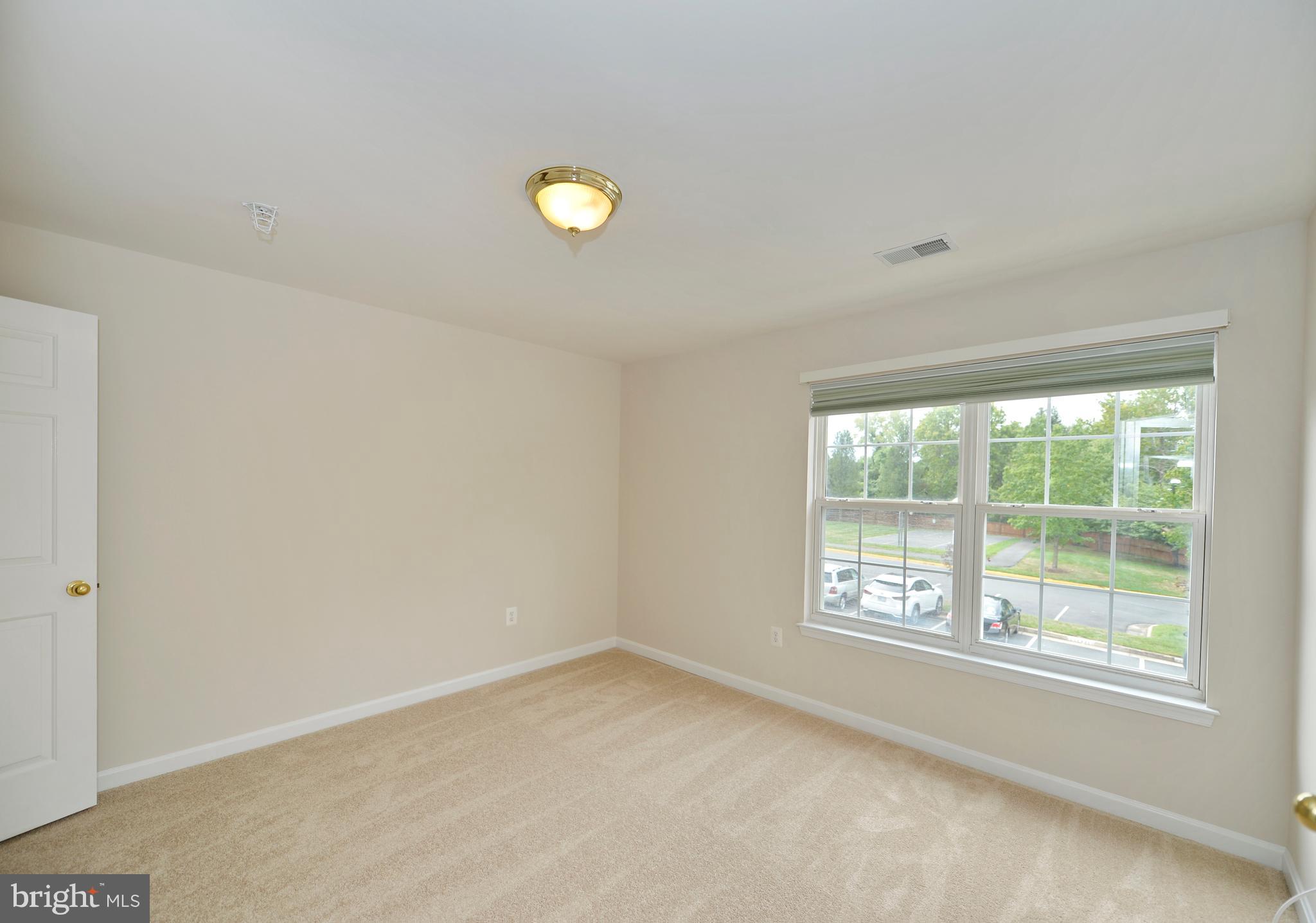 511 Constellation Square Southeast, Unit E Leesburg, VA 20175 - Photo 25 of 34 Second Spacious Bedroom