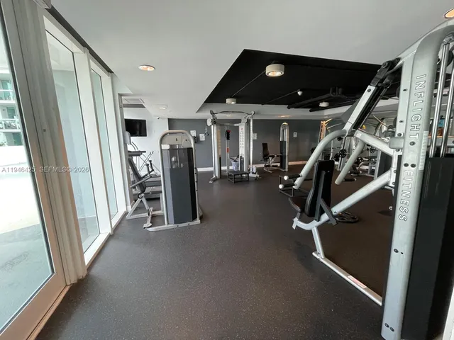 a view of a room with gym equipment