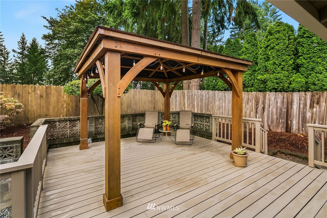 16433 Southeast 149th Street Renton, WA 98059 - Photo 11 of 22 a view of deck with wooden floor and seating space