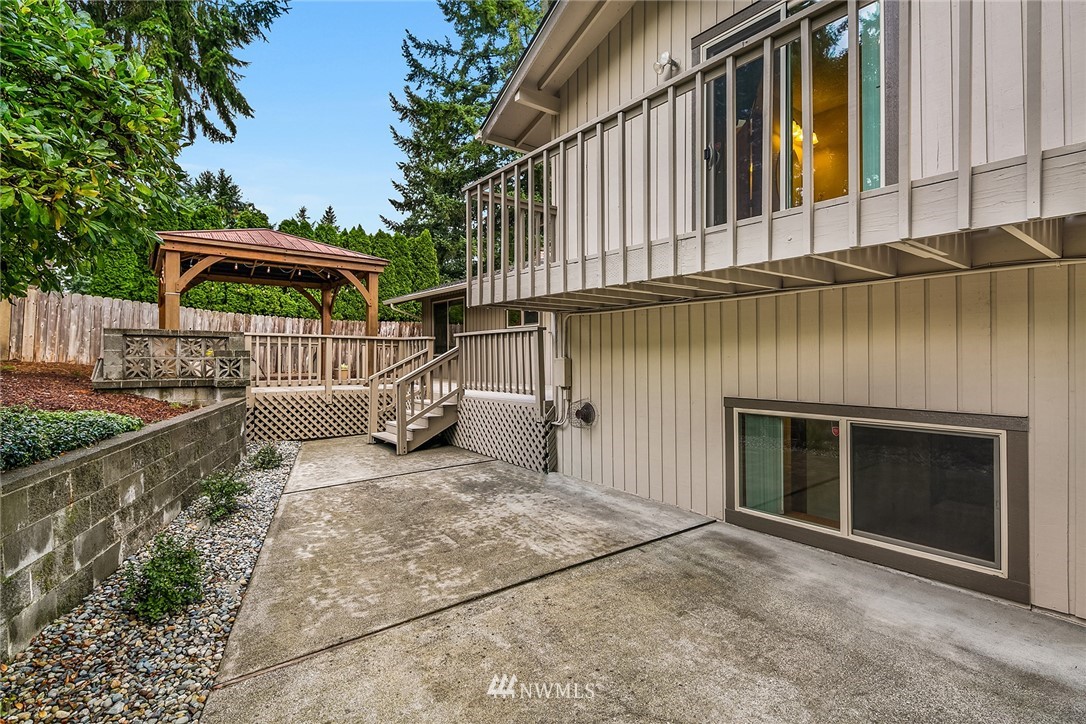 16433 Southeast 149th Street Renton, WA 98059 - Photo 12 of 22 a view of a chair and table in the house front of the house