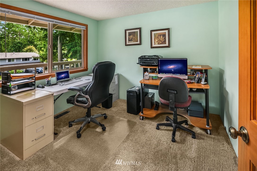 16433 Southeast 149th Street Renton, WA 98059 - Photo 15 of 22 a view of a workspace with furniture and a window