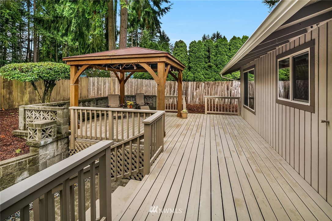 16433 Southeast 149th Street Renton, WA 98059 - Photo 9 of 22 a view of balcony with deck and wooden floor