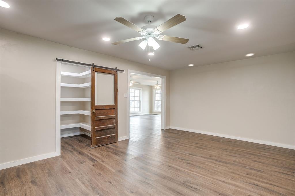 6260 Silver Creek Azle Road Azle, TX 76020 - Photo 14 of 40 wooden floor in an empty room with a window