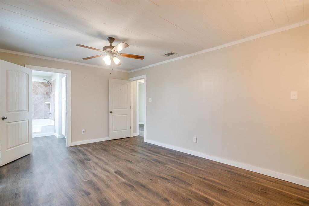 6260 Silver Creek Azle Road Azle, TX 76020 - Photo 17 of 40 wooden floor in an empty room with a window