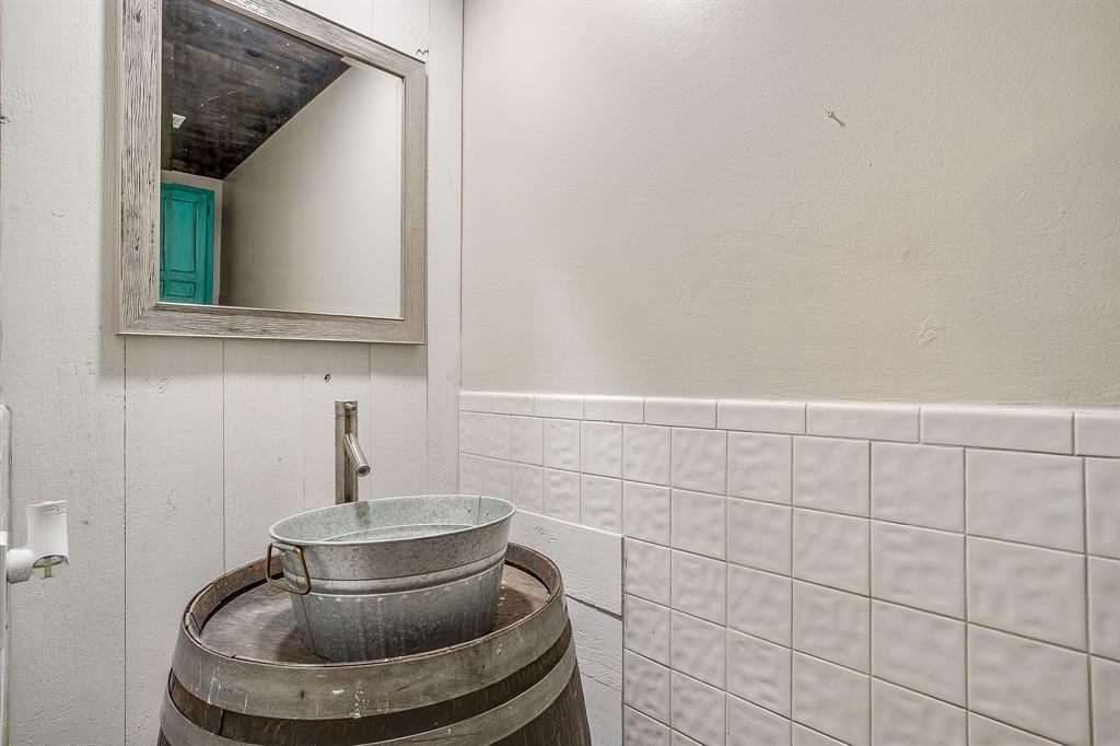 6260 Silver Creek Azle Road Azle, TX 76020 - Photo 20 of 40 a bathroom with a sink and a mirror