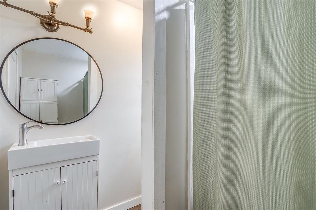 6260 Silver Creek Azle Road Azle, TX 76020 - Photo 23 of 40 a bathroom with a sink and a mirror