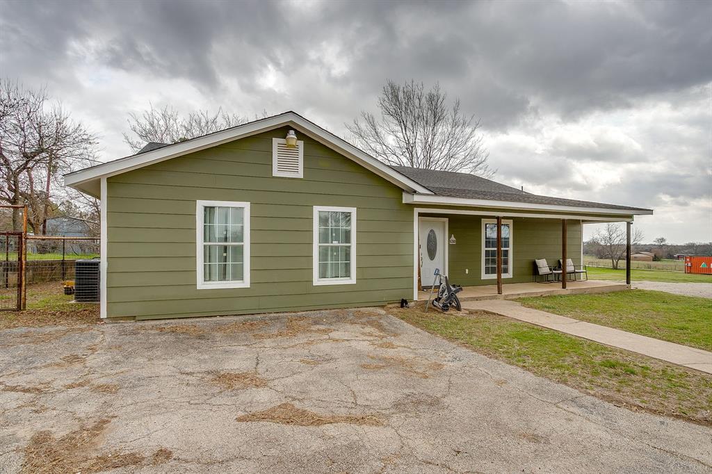 6260 Silver Creek Azle Road Azle, TX 76020 - Photo 30 of 40 a front view of a house with a yard