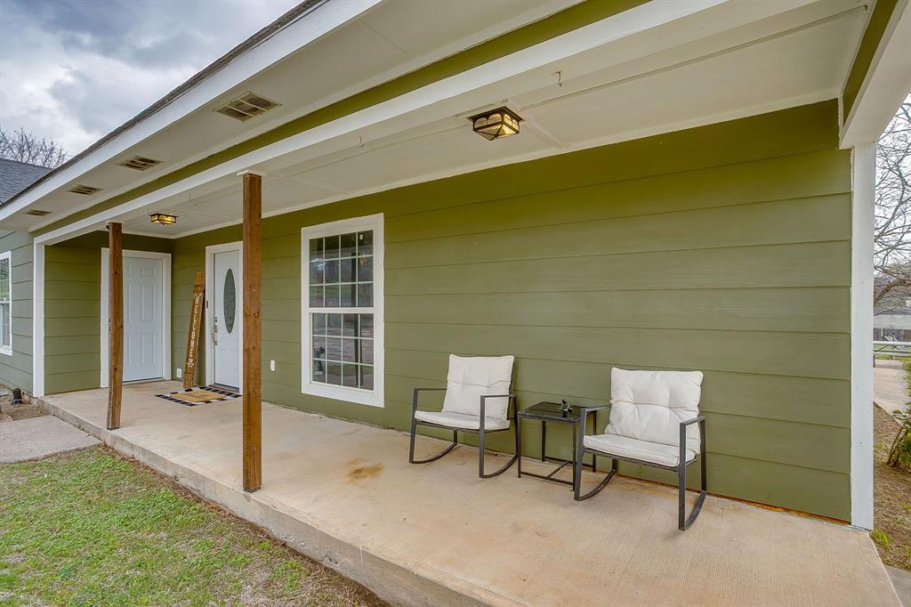 6260 Silver Creek Azle Road Azle, TX 76020 - Photo 32 of 40 a bench sitting in front of a building