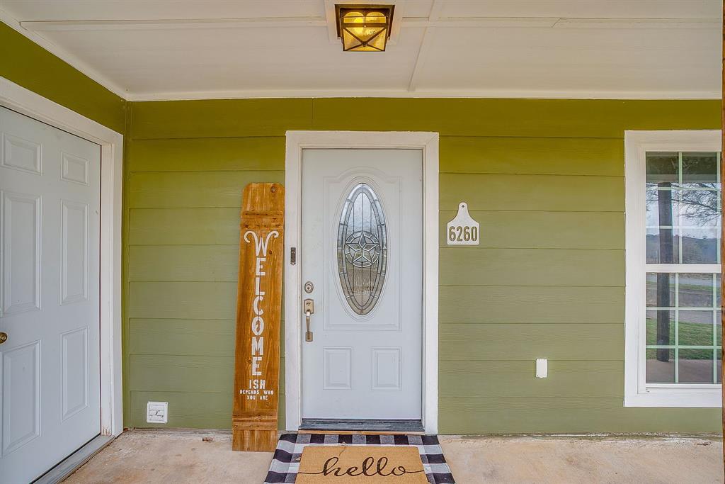6260 Silver Creek Azle Road Azle, TX 76020 - Photo 33 of 40 a front view of a house with front door