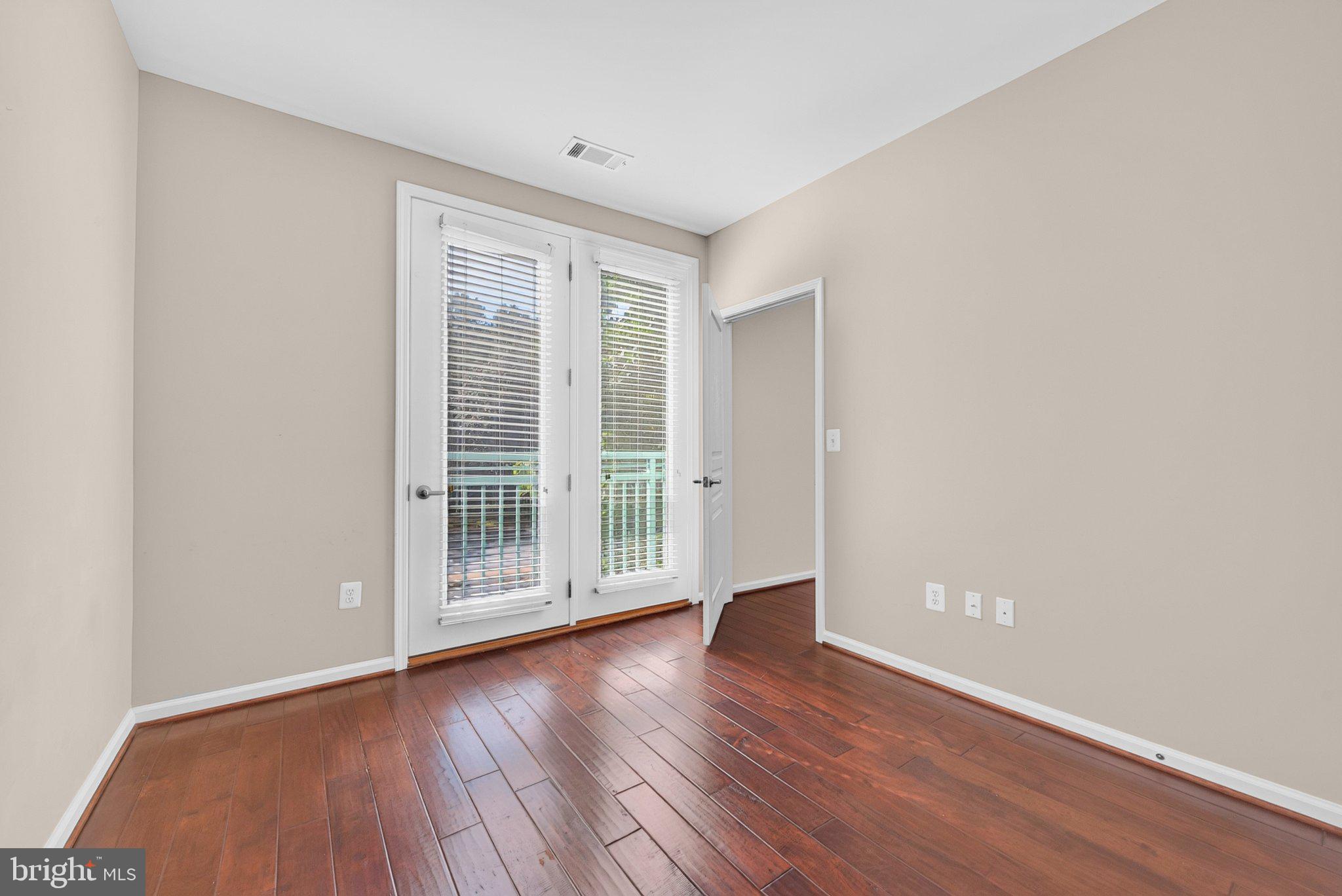 12001 Market Street, Unit 145 Reston, VA 20190 - Photo 23 of 46 Juliet Balcony off of the Second Bedroom