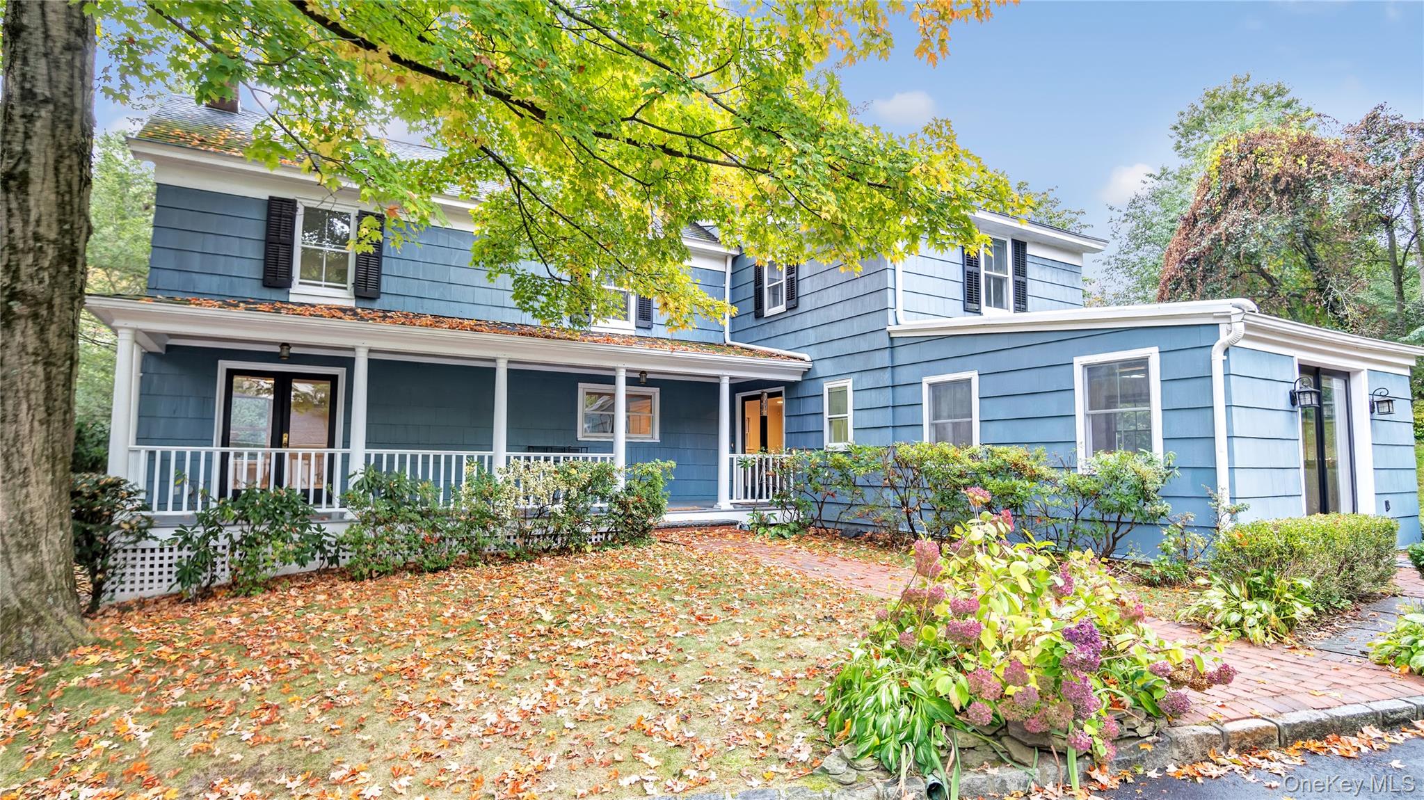 113 Buckram Road Locust Valley, NY 11560 - Photo 1 of 20 Front Of House With Porch