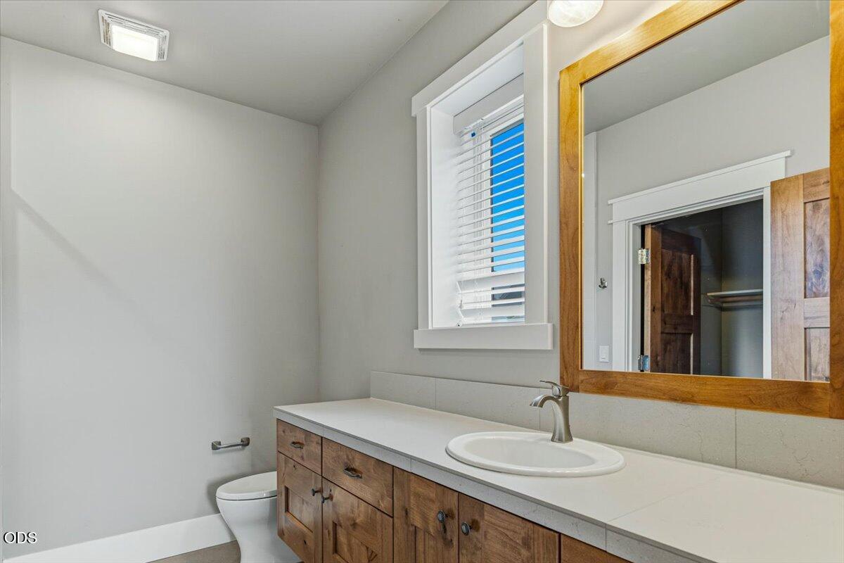 61333 Kindle Rock Loop Bend, OR 97702 - Photo 43 of 53 a bathroom with a sink and a mirror