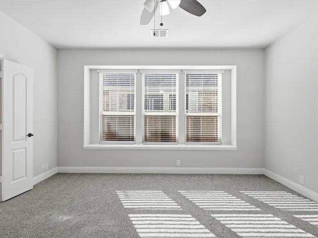 a view of a room with a window