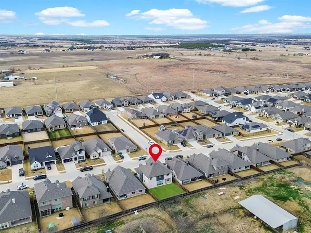 an aerial view of beach and ocean