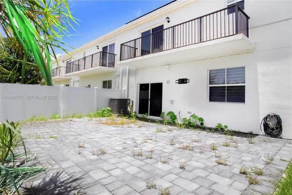 a house view with a garden space