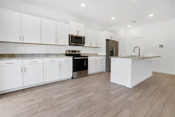 a view of street with houses