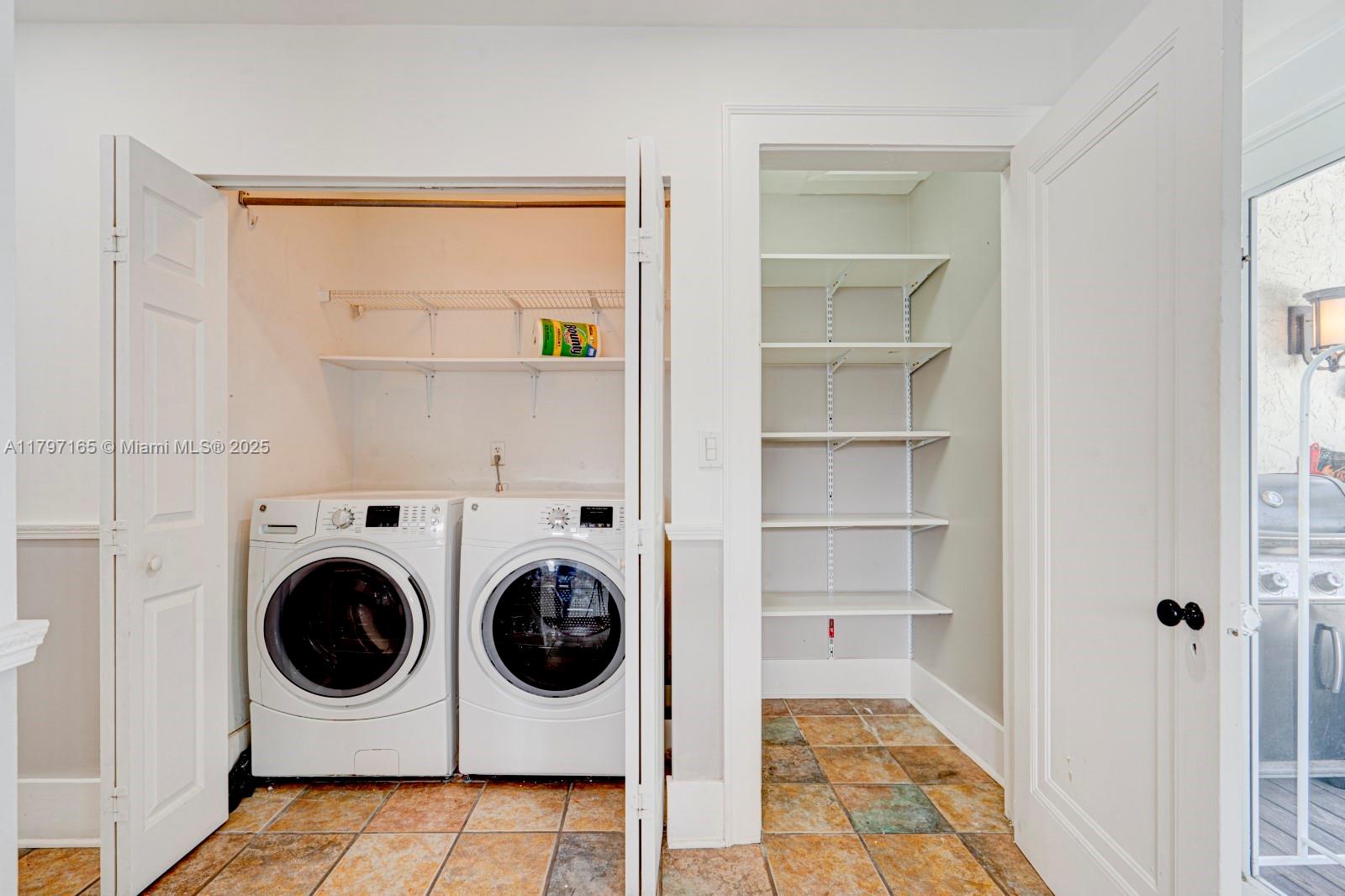 428 Southwest 23rd Road Miami, FL 33129 - Photo 12 of 36 a utility room with dryer and washer