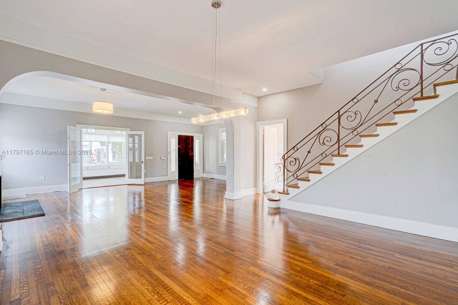 428 Southwest 23rd Road Miami, FL 33129 - Photo 15 of 36 a view of entryway and hall with wooden floor