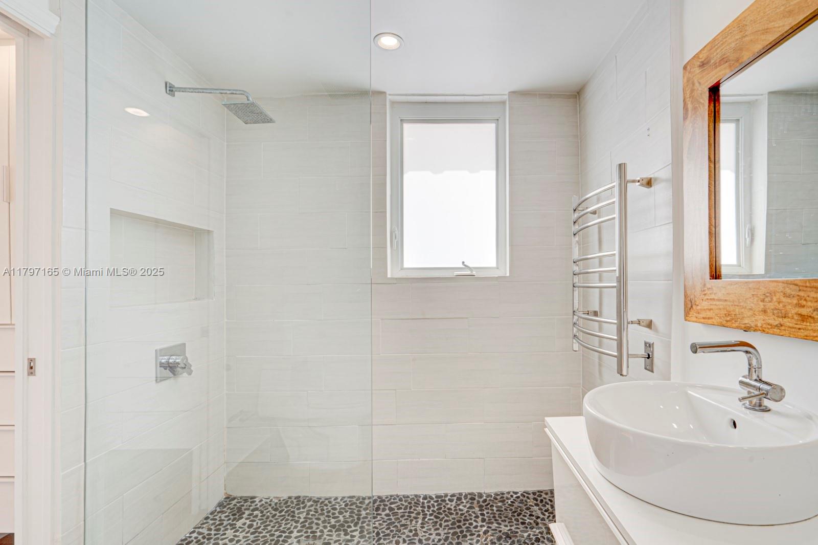 428 Southwest 23rd Road Miami, FL 33129 - Photo 21 of 36 a bathroom with a sink a toilet and shower