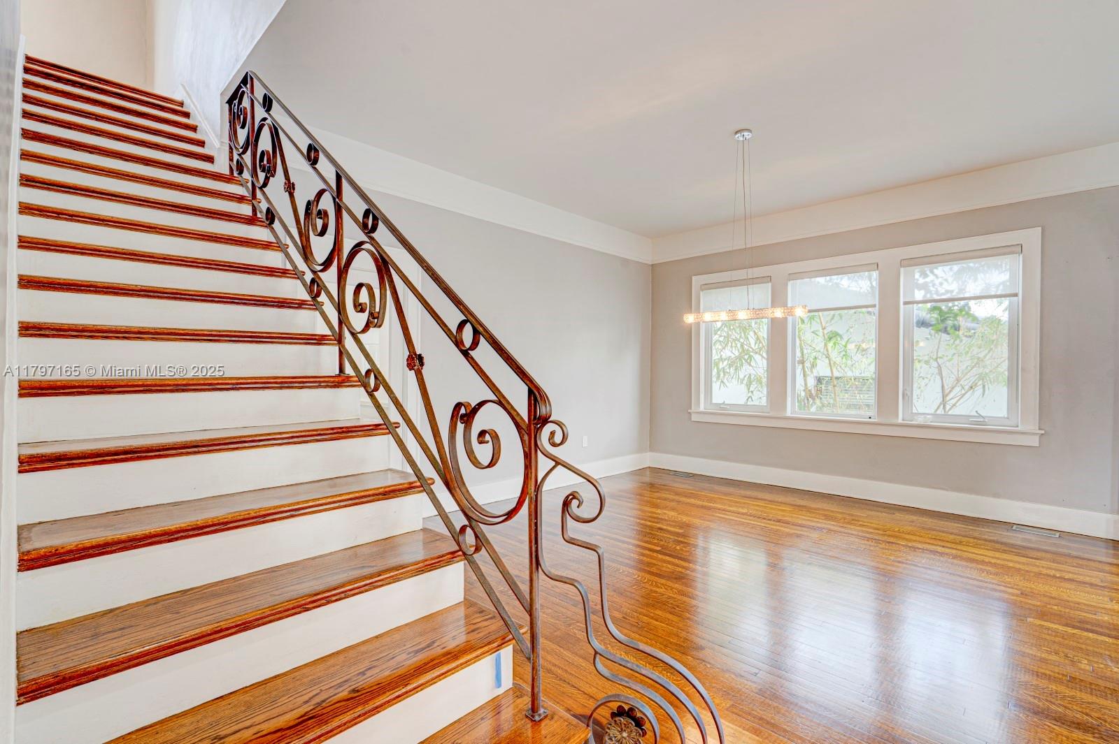 428 Southwest 23rd Road Miami, FL 33129 - Photo 22 of 36 a view of entryway and hall with wooden floor