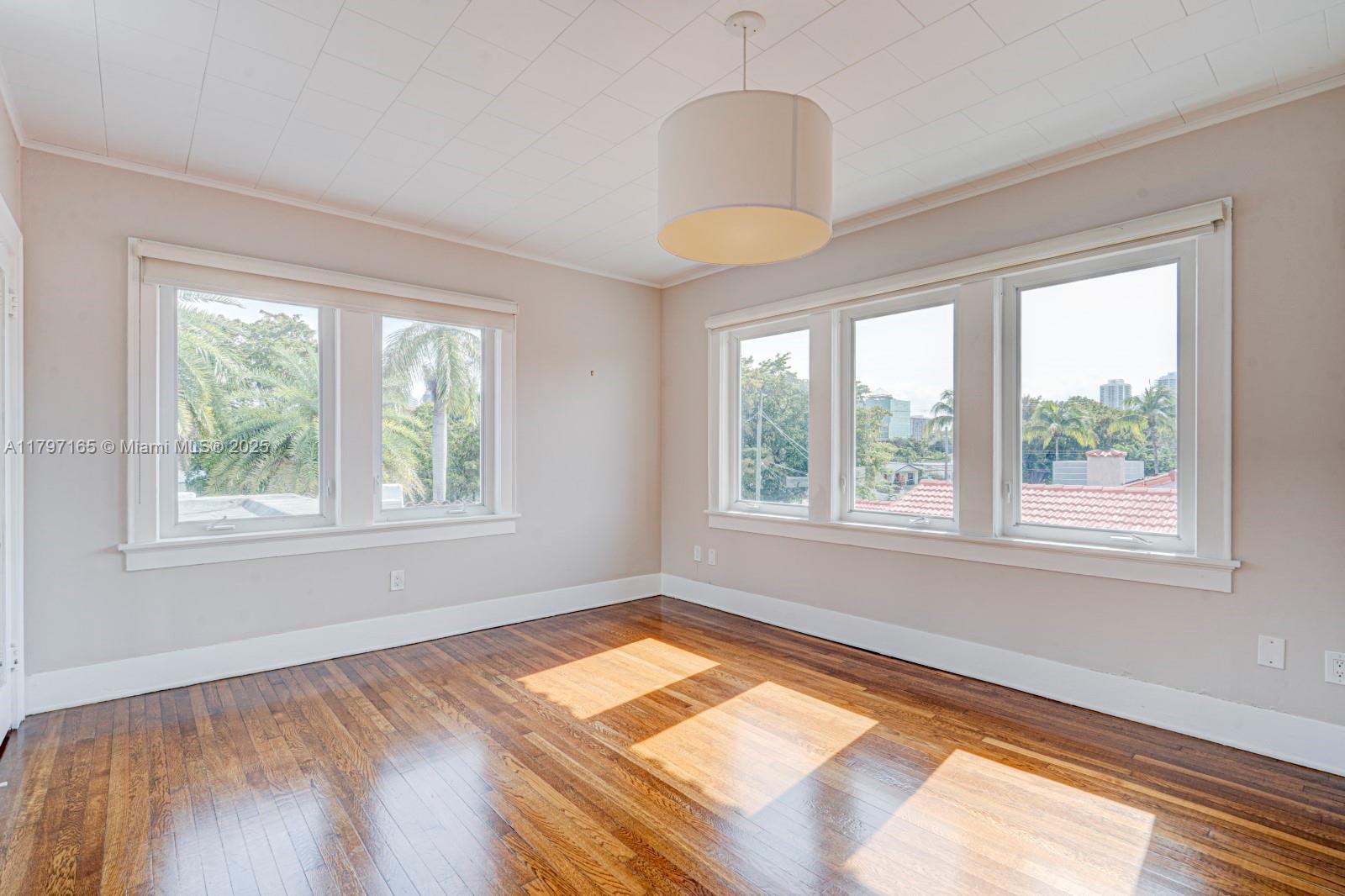 428 Southwest 23rd Road Miami, FL 33129 - Photo 23 of 36 a view of an empty room with a window