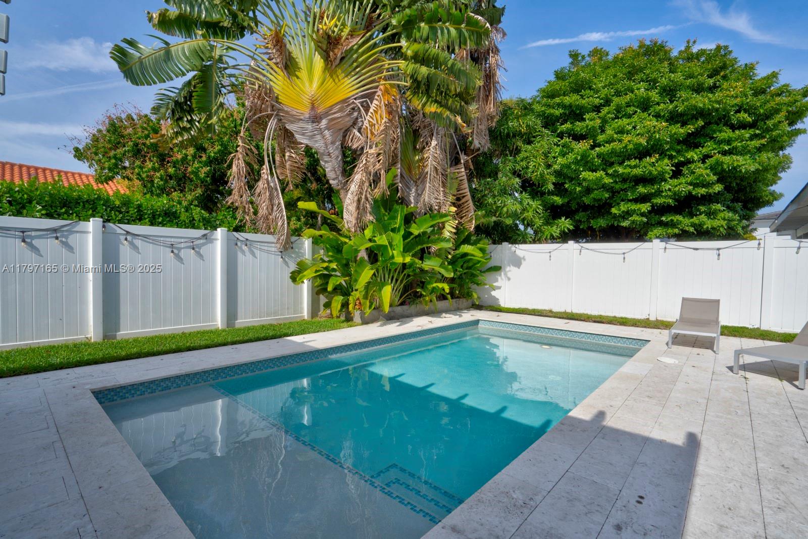 428 Southwest 23rd Road Miami, FL 33129 - Photo 26 of 36 a view of swimming pool with a yard
