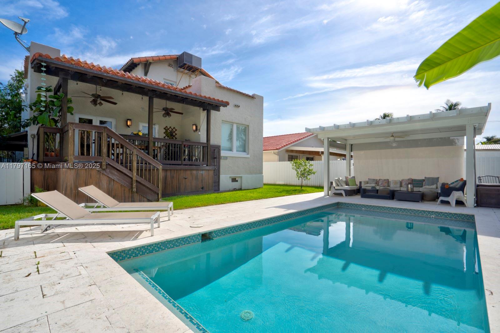 428 Southwest 23rd Road Miami, FL 33129 - Photo 28 of 36 a view of a house with a swimming pool