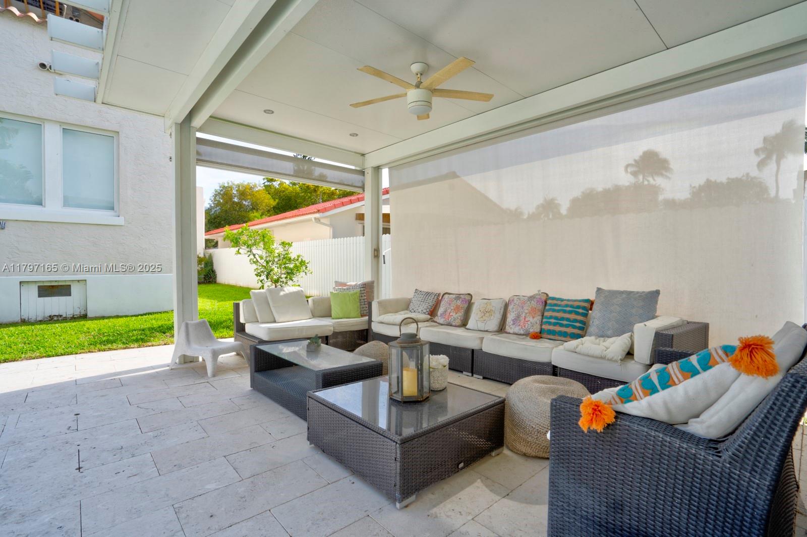 428 Southwest 23rd Road Miami, FL 33129 - Photo 31 of 36 a living room with furniture and a large window