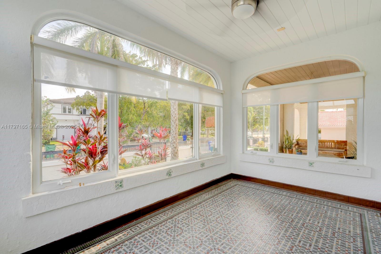 428 Southwest 23rd Road Miami, FL 33129 - Photo 6 of 36 a view of an empty room with window
