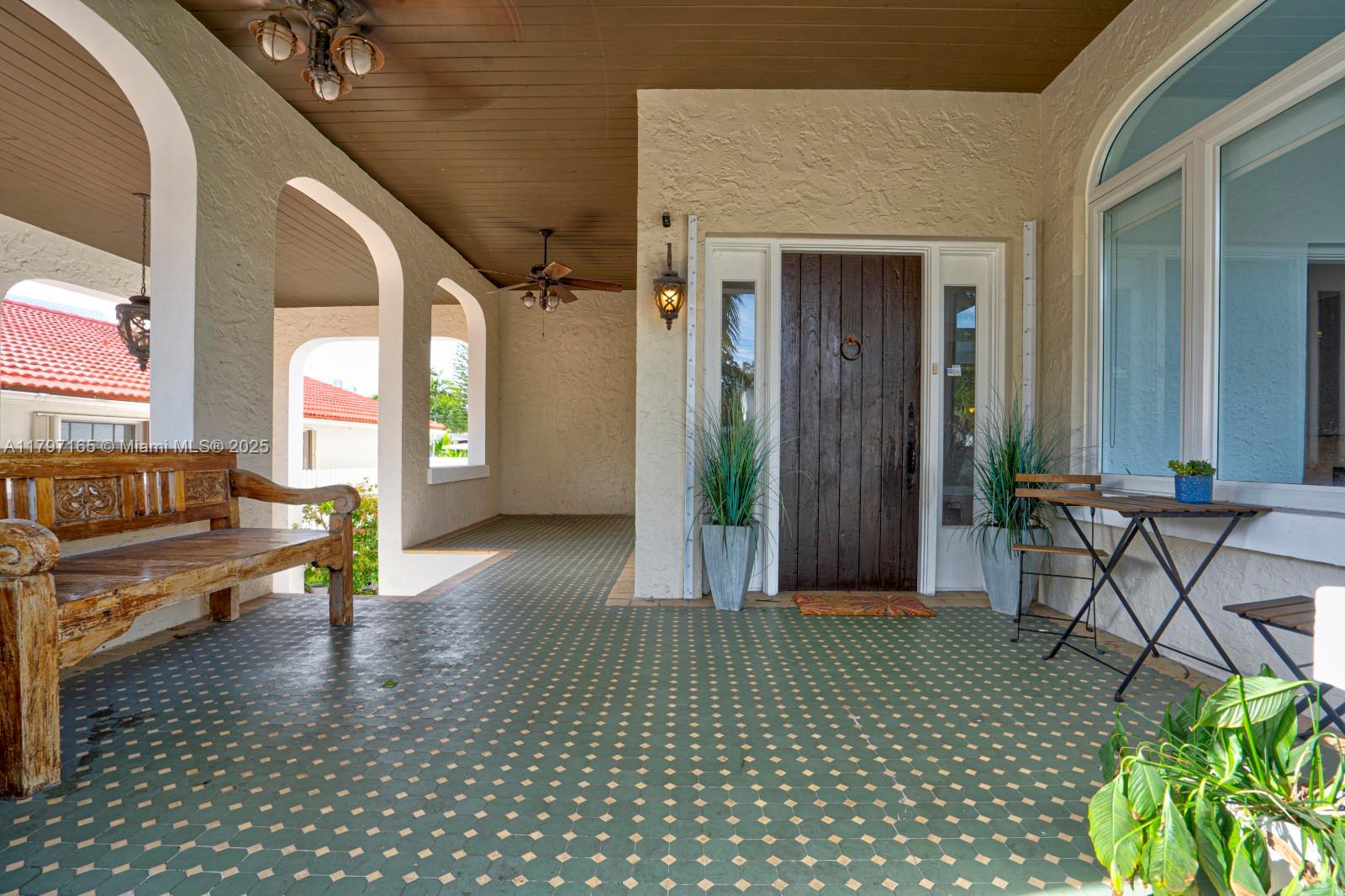 428 Southwest 23rd Road Miami, FL 33129 - Photo 7 of 36 a view of a lobby with a bench and a couch