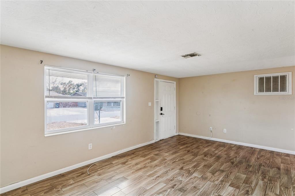 4837 Vision Avenue Holiday, FL 34690 - Photo 13 of 38 a view of an empty room with a window