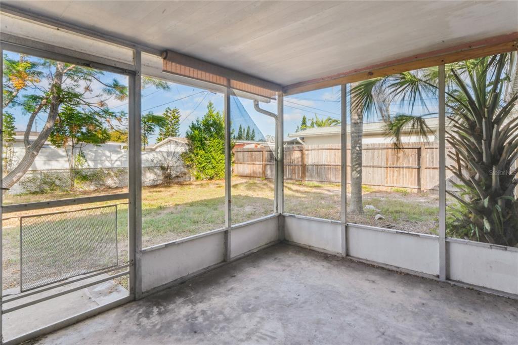 4837 Vision Avenue Holiday, FL 34690 - Photo 29 of 38 wooden floor and an empty room with large windows